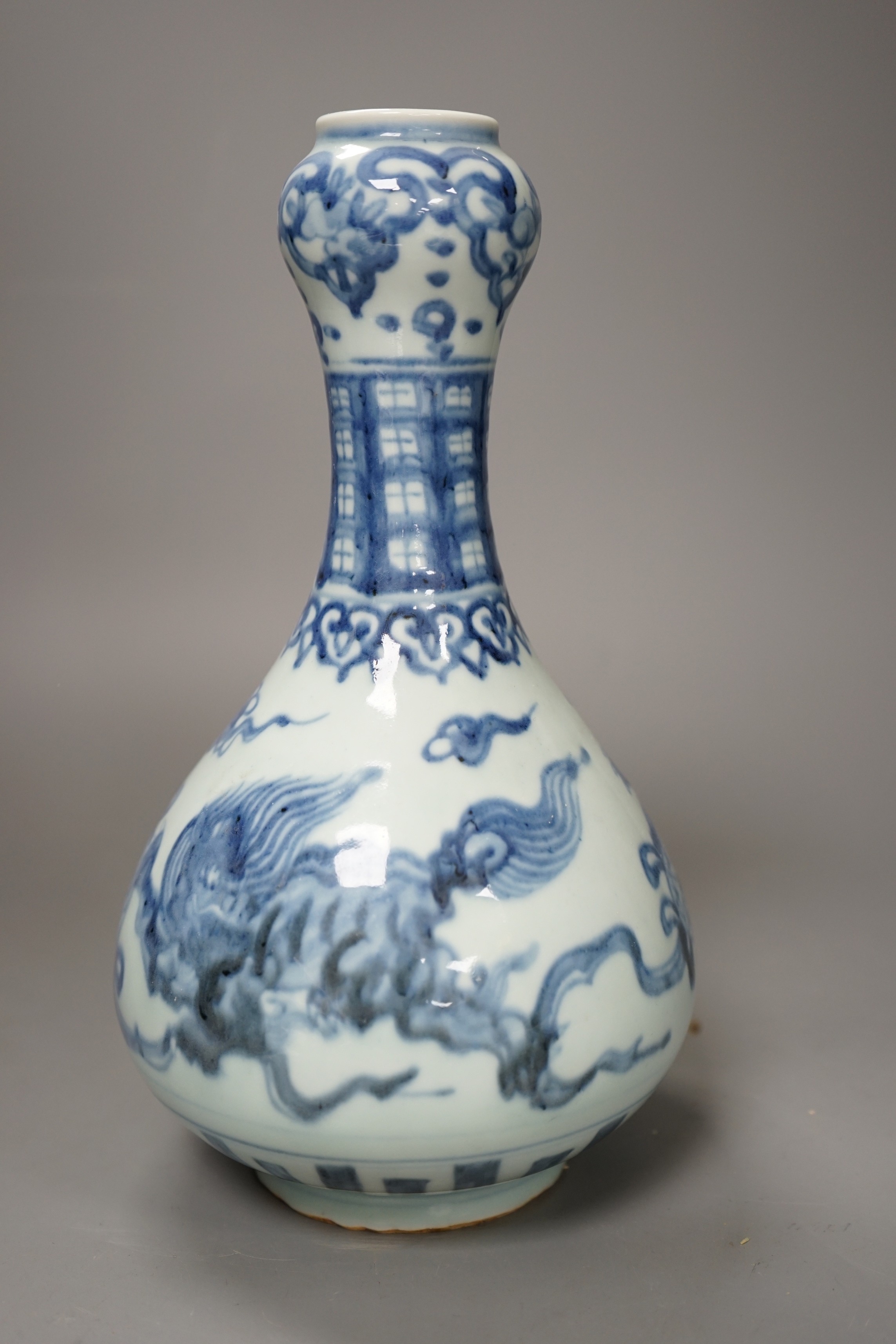 A Chinese blue and white 'dragon' vase, 26cm tall
